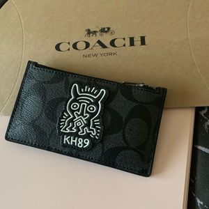 KEITH HARING ZIP CARD CASE IN SIGNATURE CANVAS
